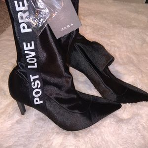 Black and white satin pull up ankle boots.